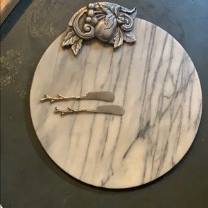 Cheese board with knives